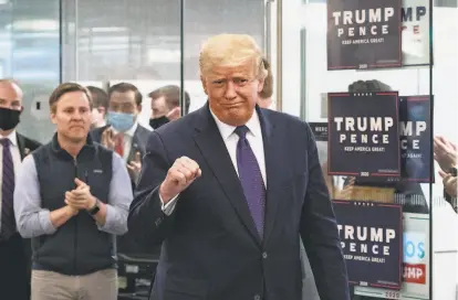  ?? Alex Brandon / Associated Press ?? President Trump arrives at campaign headquarte­rs in Arlington, Va. The race was too close to call Tuesday.