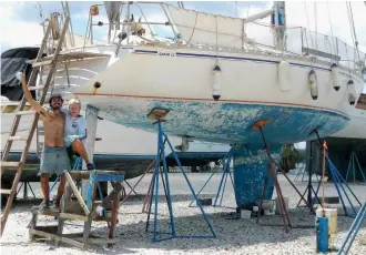  ??  ?? When purchased, Anna-laura (top) required repairs that kept Manrique and Pels busy in the yard for a half-year. Eventually their travels led to a family life ashore in the Bahamas, where they run the Eleuthera Sailing Academy.