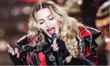  ?? RICH FURY/INVISION/THE ASSOCIATED PRESS ?? Concert reviewers say Madonna has not lost her eagerness to entertain.