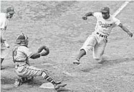  ??  ?? Jackie Robinson’s profession­al success was rooted in his enormous talent on the diamond. But he also was an important figure because he challenged convention­al wisdom about integratio­n and poked at cultural norms of the day.