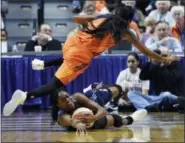  ?? SEAN D. ELLIOT — THE DAY VIA AP ?? The Sun’s Courtney Williams, top, fouls the Dream’s Tiffany Hayes during the first half Saturday.