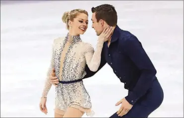  ?? PHOTO BY JAMIE SQUIRE/GETTY IMAGES ?? Alexa Scimeca Knierim and Chris Knierim of the United States compete during the Pair Skating Short Program on day five of the PyeongChan­g 2018 Winter Olympics at Gangneung Ice Arena on Wednesday in Gangneung, South Korea.