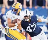  ?? Rick Bowmer / Associated Press ?? BYU linebacker Jackson Kaufusi (47) tackles McNeese State quarterbac­k Cody Orgeron, left, in the second half during a game in 2018.