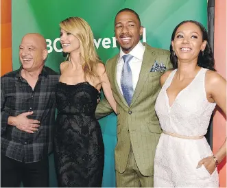  ?? CHRIS PIZZELLO/ INVISION/ THE ASSOCIATED PRESS ?? Howie Mandel, left, Heidi Klum, Nick Cannon and Mel B prepare for a new season of America’s Got Talent, which host Cannon describes as the best summer job ever.