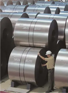  ?? AP PHOTO, LEFT; AP FILE PHOTO, ABOVE ?? MADE OF STEEL: Trump plans high tariffs for steel imported from abroad, but U.S. producers can’t currently produce enough for domestic needs.