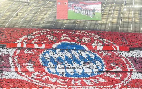  ??  ?? Bayern Munich supporters create the club’s logo in the stands during a Bundesliga match recently.