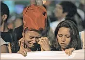  ?? LEO CORREA/AP ?? A woman cries as she takes part in a protest against the slaying of Councilwom­an Marielle Franco in Rio de Janeiro.