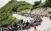  ??  ?? The photo that went viral on social media shows hundreds of motorcycle riders and back riders converged at Badian Highlands, a tourist attraction in Badian town 104 kilometers south of Cebu City. Mayor Carmentica Librando Lumain issued Executive Order 22 temporaril­y closing the facility due to health protocol violations. (Photo courtesy of Maurice Navarro)