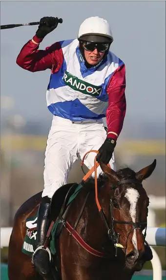  ??  ?? Derek Fox celebrates after winning the Grand National on board One For Arthur. Pity I wasn’t doing the same.