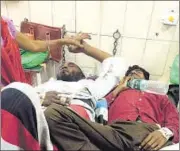  ?? HT PHOTO ?? Ali Hassan (left) and Hafiz Abdul Khalid at a hospital after being allegedly beaten up on Wednesday.