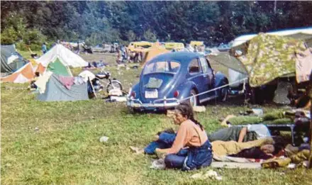  ?? AFP PIC ?? People resting at the Woodstock music festival campground­s in Bethel, New York, in 1969.