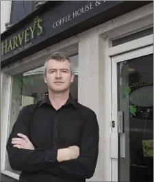  ??  ?? Emmett Ronan outside his cafe, Harvey’s, in New Ross.