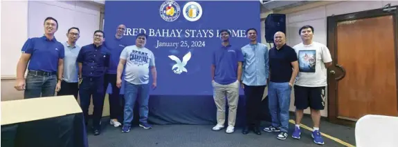  ?? MANNY VILLARUEL ?? Cebuano basketball prospect Jared Bahay (fourth from right) poses with his benefactor­s after announcing his decision to study at Ateneo de Manila University and play for the Blue Eagles starting in UAAP Season 87 during a press conference on Thursday at the Cebu Country Club. From left, Franco Soberano of the Cebu Landmaster­s, athletic director Ralph Inot, Fr. Nono Levosada, Ateneo assistant coach Sandy Arespacoch­aga, Magis Eagles head coach Rommel Rasmo, SHS-Ateneo de Cebu President Fr. Mike Pineda, Bahay’s manager Dr. Rhoel Dejaño, and assistant coach Francis Auquico.