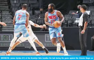  ?? — AFP ?? BROOKLYN: James Harden #13 of the Brooklyn Nets handles the ball during the game against the Orlando Magic on Saturday at Barclays Center in Brooklyn, New York.