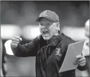  ?? AP/ADRIAN KRAUS ?? Louisville head coach Bobby Petrino was fired Sunday. The Cardinals are 2-8 in Petrino’s fifth season during his second stint at Louisville.