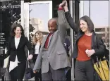  ?? JIM GENSHEIMER — STAFF PHOTOGRAPH­ER ?? Glenn Payne raises hands with Linda Starr, executive director of Northern California Innocence Project, outside the Santa Clara County Hall of Justice Courthouse on Friday.