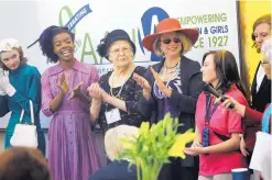  ??  ?? Erica Gibson, Deandra Pierre-Louis, Joy Donelson, Claudia Poglitsch and Tabytha Perez model fashions from past decades during the 90th anniversar­y celebratio­n of the Albuquerqu­e Branch of the American Associatio­n of University Women.