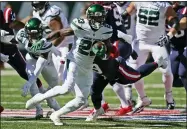  ?? FRANK FRANKLIN II - THE ASSOCIATED PRESS ?? New York Jets’ Tevin Coleman (23) runs the ball during the first half of an NFL football game against the New England Patriots, Sunday, Sept. 19, 2021, in East Rutherford, N.J.