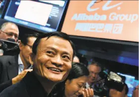  ?? Jewel Samad / AFP / Getty Images ?? Alibaba founder Jack Ma, here at the New York Stock Exchange last year, has replaced the e- commerce giant’s CEO and instituted a hiring freeze.