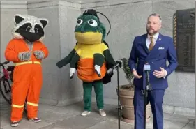  ?? Hallie Lauer/Post-Gazette ?? Deputy Mayor Jake Pawlak addresses the need for greater waste reduction while outlining some of the city’s recycling efforts Wednesday in the portico of the City-County Building, Downtown.