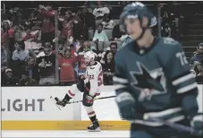  ?? AP PHOTO/JEFF CHIU ?? Washington Capitals defenseman Matt Irwin (52) celebrates after scoring a goal against the San Jose Sharks during the second period of an NHL hockey game in San Jose, Calif., on Saturday.