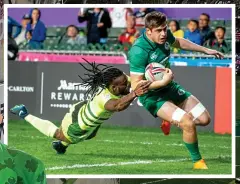  ??  ?? TRYING TIMES: Ireland’s Bryan Mollen in action at the Rugby Sevens tournament