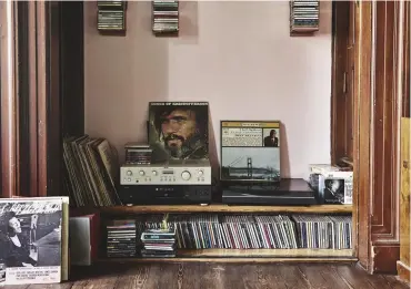  ??  ?? this page: in the living room, a recess that was originally a doorway is used to store Lamptey’s stereo and record collection. opposite page: in the kitchen, a classic American diner-style table bought secondhand; Ant chairs by ARNE JACOBSEN; photo by...