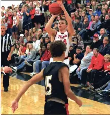  ?? LARRY GREESON / For the Calhoun Times ?? Sonoravill­e’s Brad Wilson rises up for a shot over a North Murray defender during Friday’s game.