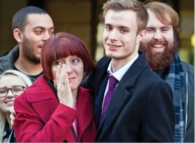  ??  ?? Tears of relief: Liam Allan outside court with his mother Lorraine and his supporters