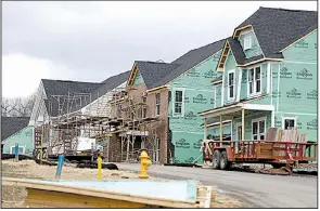  ?? AP file photo ?? New home constructi­on is under way in Zelienople, Pa., in March. It has been a good year for homebuilde­rs and those who invest in them.