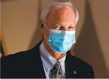  ?? CHIP SOMODEVILL­A GETTY IMAGES ?? Sen. Ron Johnson, R-Wis., who has tested positive for COVID-19, said that he would go to the Capitol “in a moon suit” to vote to confirm Judge Amy Coney Barrett to the U.S. Supreme Court.