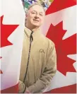  ?? ERROL McGIHON ?? Today is Flag Day in Canada, but it’s always flag day for Al McLaughlin, manager of the local store in the Flag Shop chain.