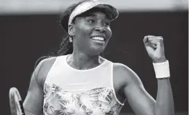  ?? CAMERON SPENCER Getty Images ?? Venus Williams was all smiles after rallying to beat 25th-seeded Mihaela Buzarnescu 6-7 (3-7), 7-6 (7-3), 6-2 in the first round of the Australian Open on Tuesday.