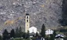  ?? ?? The rockfall stopped just short of the village church. Photograph: Michael Buholzer/