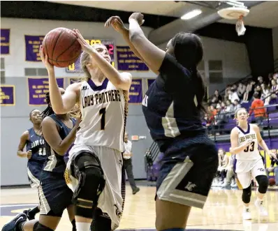  ?? Staff photo by Hunt Mercier ?? ■ Fouke’s Crysta Larey goes up for a layup against Lafayette County on Thursday at Fouke High School in Fouke, Ark.