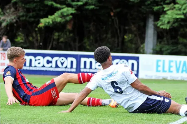  ?? ?? Luke Spokes pokes home the Romans’ first goal of the afternoon