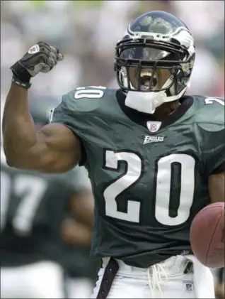  ?? CHRIS GARDNER — ASSOCIATED PRESS FILE ?? In a September 2002 photo, Eagles safety Brian Dawkins reacts after intercepti­ng a pass against the Texas in Philadelph­ia.