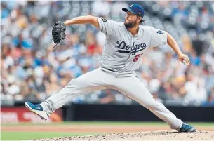  ?? GREGORY BULL THE ASSOCIATED PRESS FILE PHOTO ?? Yes, we’d like to see Clayton Kershaw pitch his way out of a jam, but there’s no case so compelling for the sport returning that we can’t sit out the rest of the year.