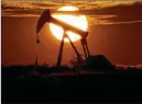  ?? ERIC GAY/AP FILE ?? Oil prices are at seven-year highs and have spiked fuel costs for heating, flying and driving.