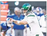  ?? Anthony J. Causi; Bill Kostroun ?? ONE AND DONE: Jets quarterbac­k Sam Darnold makes adjustment­s at the line of scrimmage during the preseason the opener. Darnold (far right), completed 4-of-5 passes for 68 yards and a touchdown in his only drive.