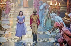  ?? [PHOTO BY LAURIE SPARHAM, DISNEY/AP] ?? This image released by Disney shows Mackenzie Foy, left, and Jayden Fowara Knight in a scene from “The Nutcracker and the Four Realms.” Starring: