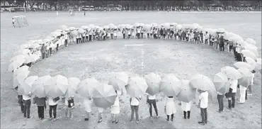  ??  ?? Photo shows Novo Nordisk, UST, PSEDM and participan­ts and patients with diabetes forming the blue circle calling for unity to make a difference against diabetes.