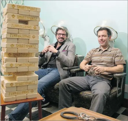  ?? JENELLE SCHNEIDER/PNG ?? Dan Civiero, left, and Chris Ricard, ‘chief fun officers’ at Smarty Pantz in Vancouver, have recently opened a series of live role-playing escape rooms in a downtown building.