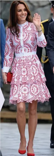  ??  ?? Stunning: In a £4,000 McQueen dress yesterday