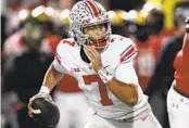 ?? NICK WASS AP ?? Ohio State’s C.J. Stroud is one of four quarterbac­ks that are finalists for the Heisman Trophy.