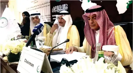  ??  ?? Saudi Foreign Minister Adel Al-Jubeir and Organizati­on of Islamic Cooperatio­n (OIC) Secretary-General Yousef Al-Othaimeen, center, at an emergency meeting in Jeddah on Sunday. (AN photo)