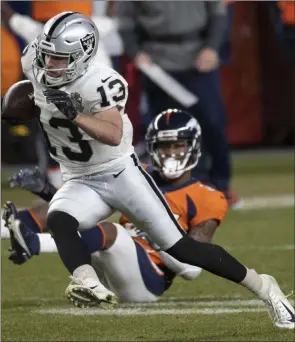  ?? Benjamin Hager Las Vegas Review-journal @benjaminhp­hoto ?? Hunter Renfrow had three catches for the Raiders in their win against the Broncos on Sunday. With that result, gamblers finished off their best winning week of the season.