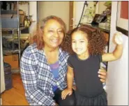  ?? CONTRIBUTE­D PHOTO ?? Nutmeg Big Brothers Big Sisters foster grandparen­t of the year and Middletown resident Carmen Sanchez and Katrina, one of the children she mentors, enjoy each other’s company at the Community Renewal Team’s Locust Street Early Care and Education Center...