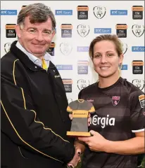  ??  ?? Katrina Parrock ofWexford Youths Women receives her player of the match award from Eddie Ryan of Continenta­l Tyres.