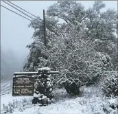  ?? Julian Liu ?? SNOW accumulati­ons reached 3 to 6 inches for areas above 1,500 feet, including Tilden Park near Berkeley.